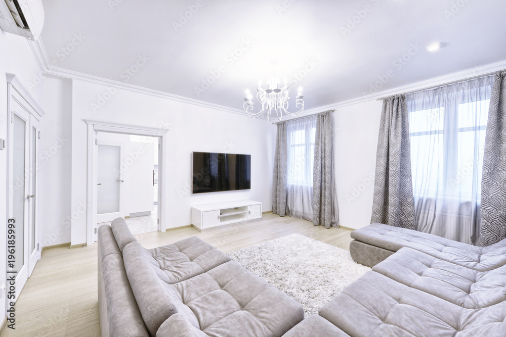 Fototapeta premium The interior of the modern living room in white.