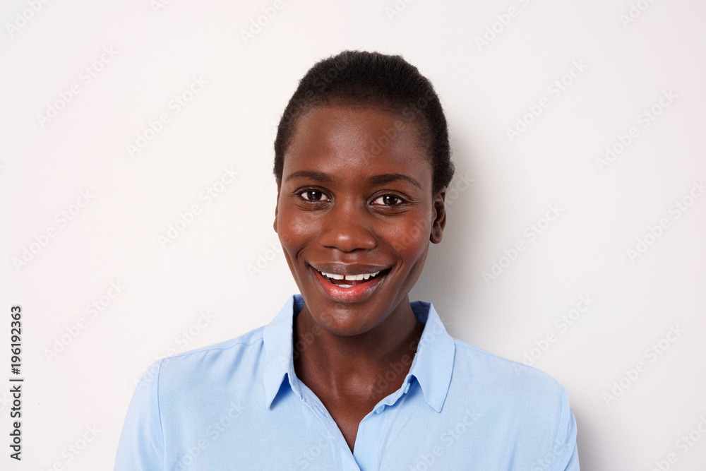 Close up african american woman smiling by white background