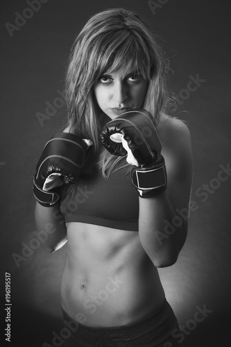 Fitness girl with boxing gloves © darezare