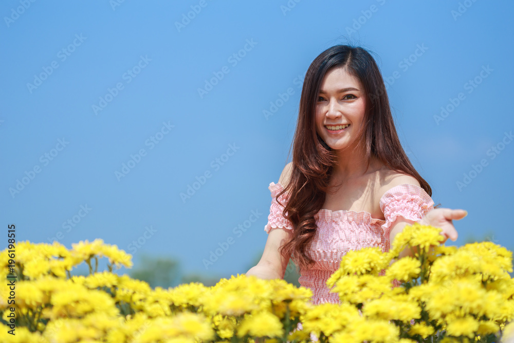 beautiful woman in chrysanthemum glower garden beautiful woman in chrysanthemum glower garden