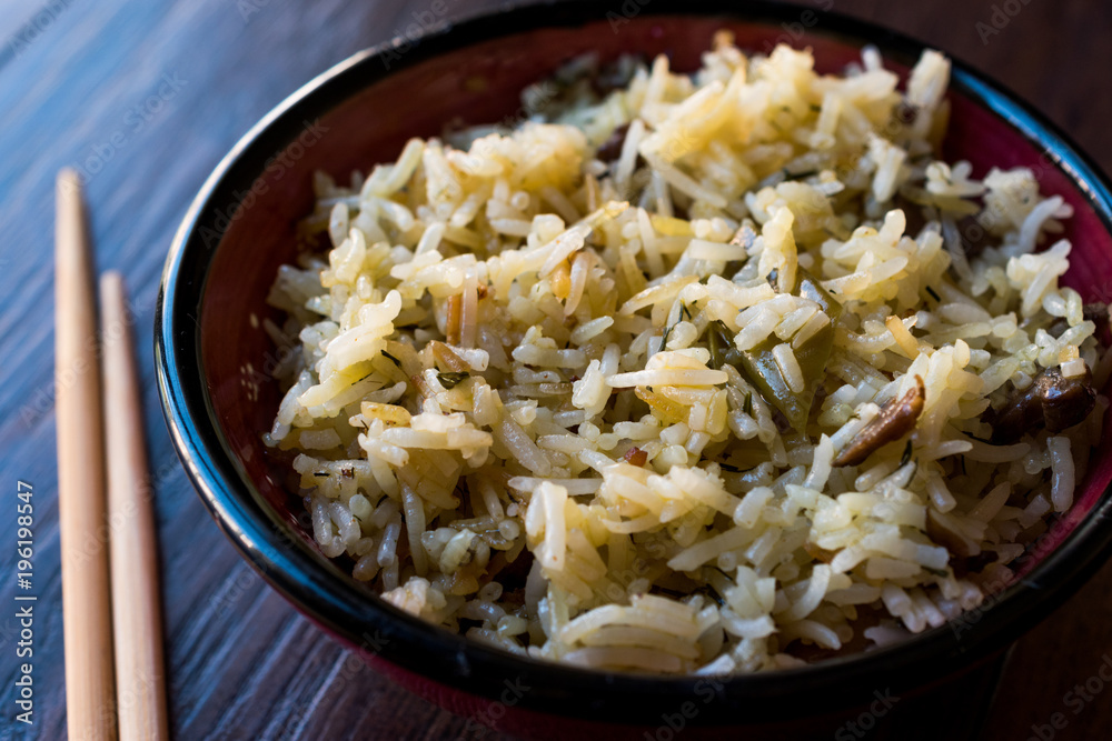 Basmati Rice with Chopsticks in Bowl Ready to Eat. Basmati Rice with Chopsticks in Bowl Ready to Eat.