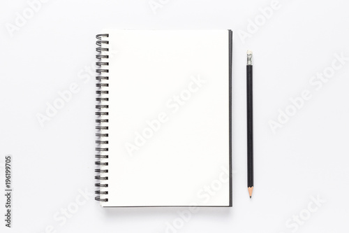 Top view, empty notebook on a white background. © suriya