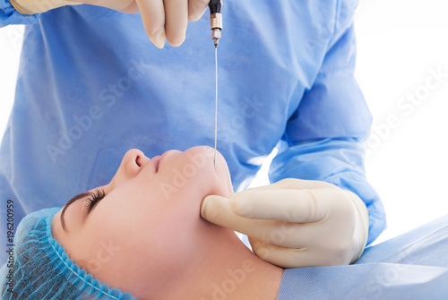 procedure for laser lipolysis of the chin or laser liposuction photo