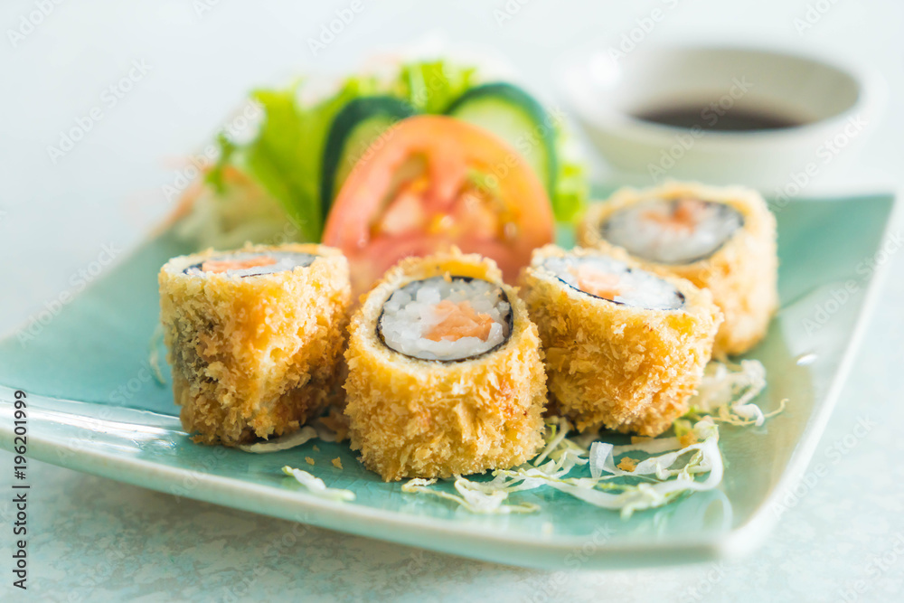 fried sushi roll with salmon fried sushi roll with salmon