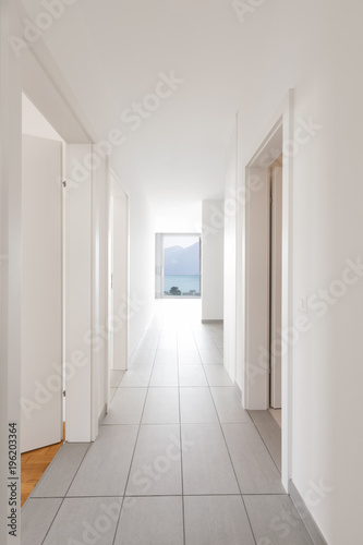 Interior of modern apartment, empty corridor