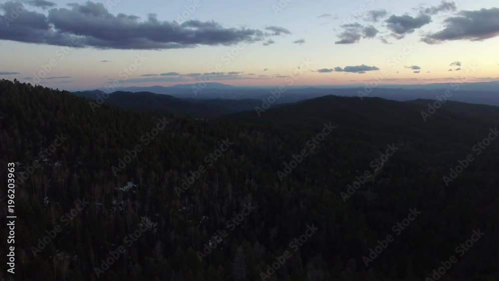Flying Over Mountain Forests at Dusk Flying Over Mountain Forests at Dusk