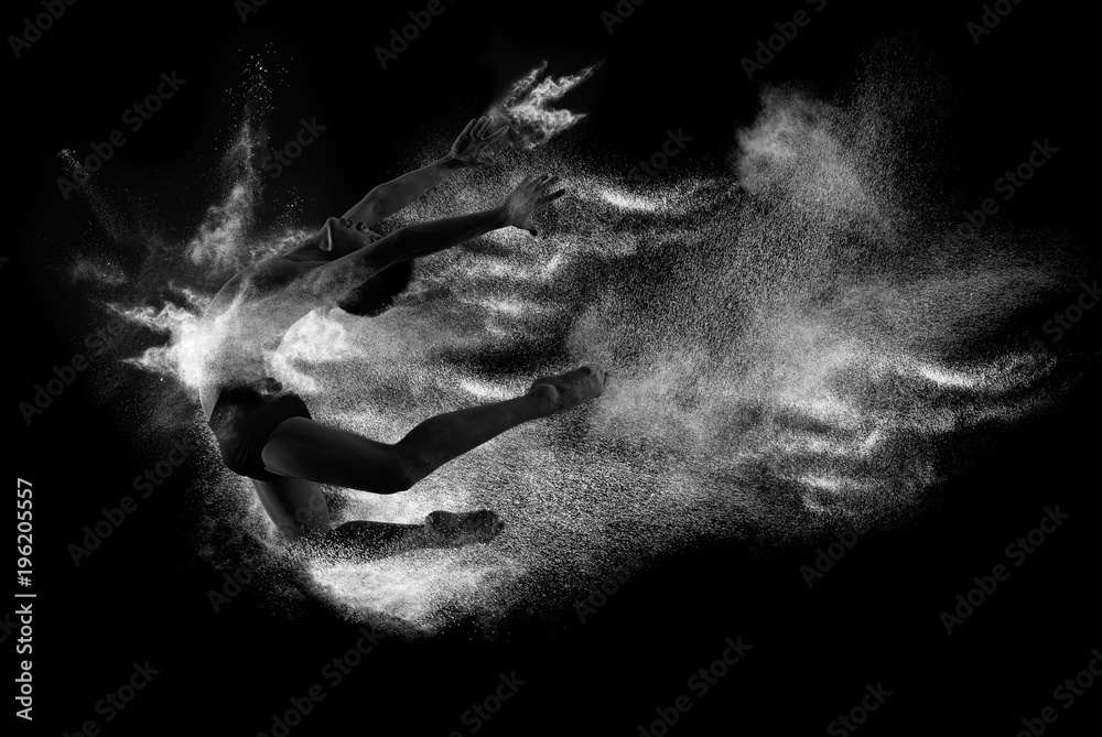 Fototapeta premium Young handsome ballet man in fly grace pose