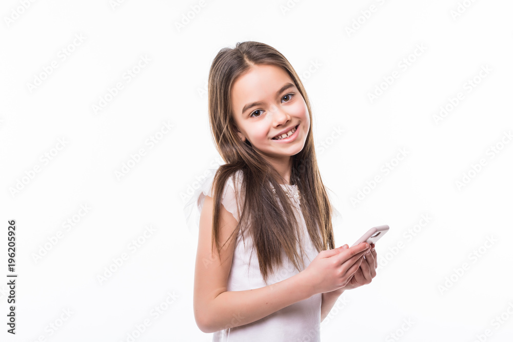 Little girl holding a smart phone against white background Little girl holding a smart phone against white background