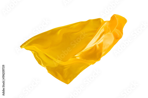 Smooth elegant transparent yellow cloth separated on white background.