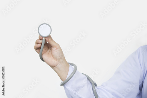 Close-up stethoscope in doctor's hands on white background