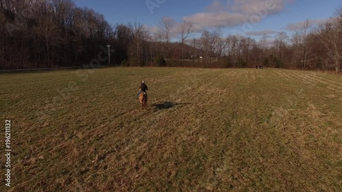 Wallpaper Mural Aerial Rural Winter Horse and Rider 002 Tracking Following Torontodigital.ca