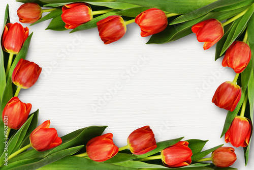 Red tulip flowers in corner arrangement