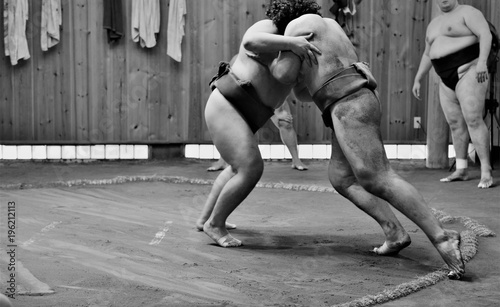 Sumo fighters and sumo wrestlers training in sumo stables preparing for the sumo tournament in Tokyo, Japan