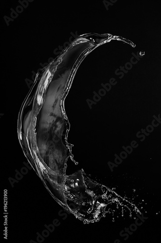 Clear, transparent water splash on black background 