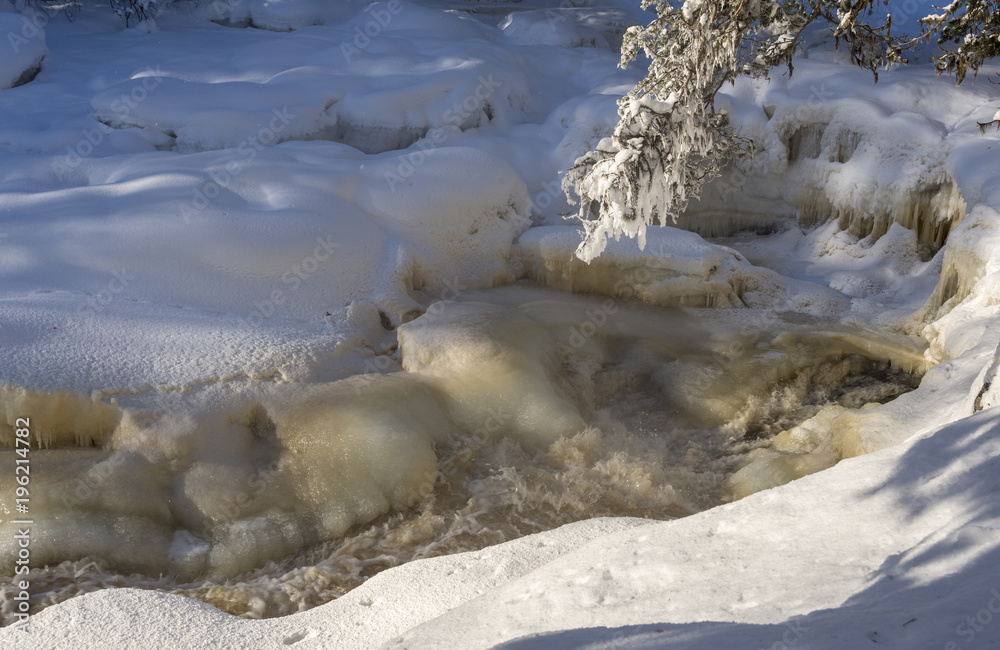 Frozen waterfall in a little stream Frozen waterfall in a little stream