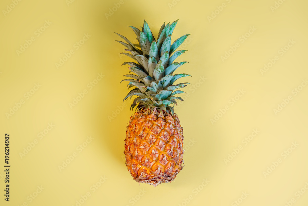 Pineapple on a yellow background