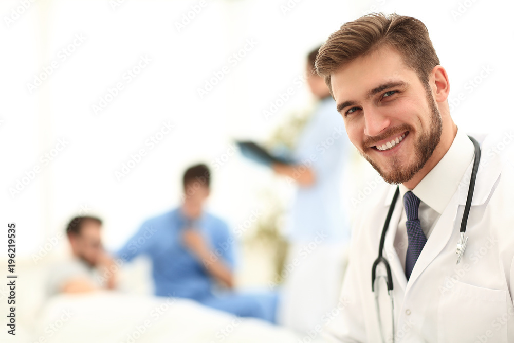 closeup.smiling doctor on blurred background. closeup.smiling doctor on blurred background.