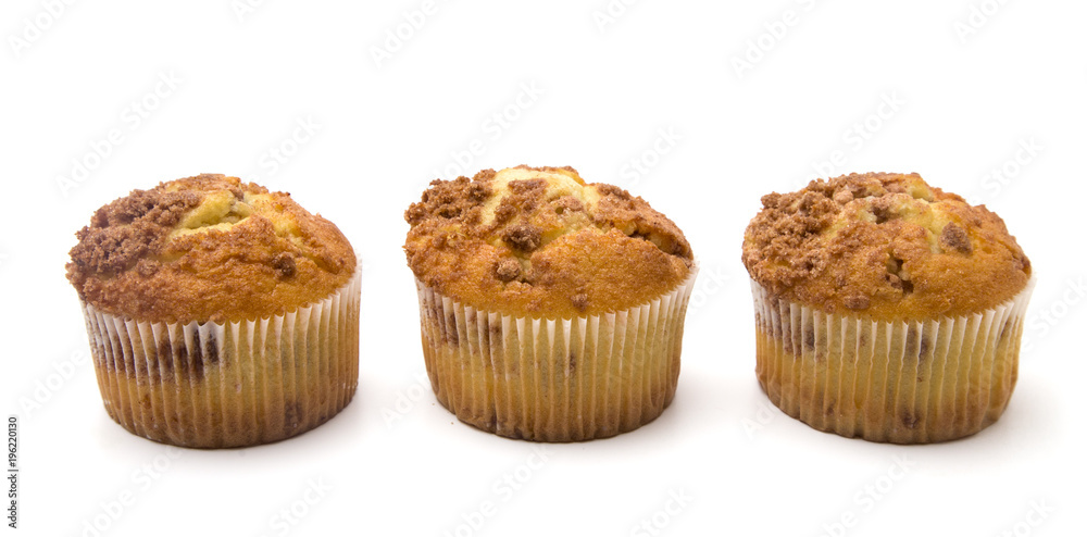 Brown Sugar and Cinnamon Muffins on a White Background Brown Sugar and Cinnamon Muffins on a White Background