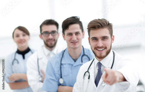 experienced doctor showing forward