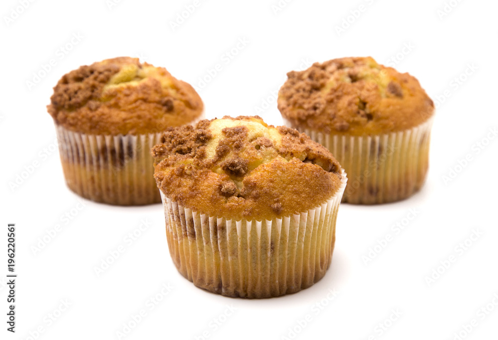 Brown Sugar and Cinnamon Muffins on a White Background Brown Sugar and Cinnamon Muffins on a White Background