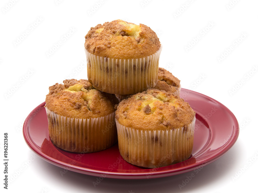 Brown Sugar and Cinnamon Muffins on a White Background Brown Sugar and Cinnamon Muffins on a White Background