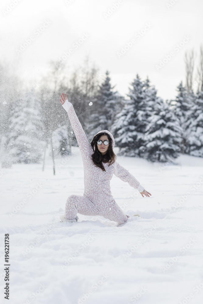 Young beautiful woman wearing onesie Young beautiful woman wearing onesie