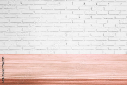 Vintage white of brick texture background with aged wood panel table top perspective.montage picture for advertising and promote product.