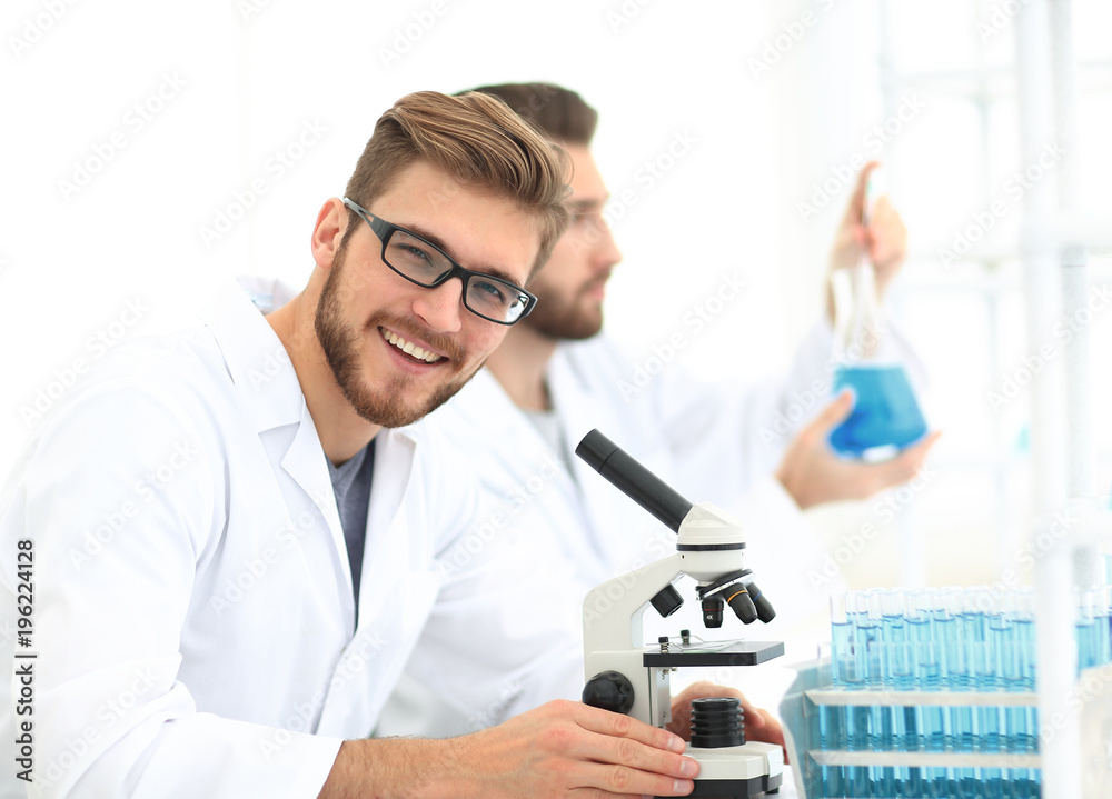 closeup. a biologist working in the laboratory closeup. a biologist working in the laboratory