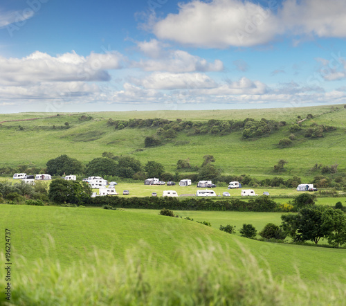 Caravan trailer camping in English green fields
