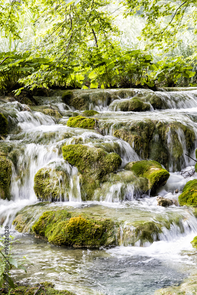 Fototapeta premium Beautiful waterfall in Plitvice Lakes National Park in summer in Croatia