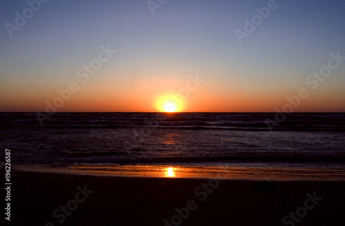 Laesoe / Denmark: Impressive sunset over the wide Kattegat Sea near Vesteroe Havn in April