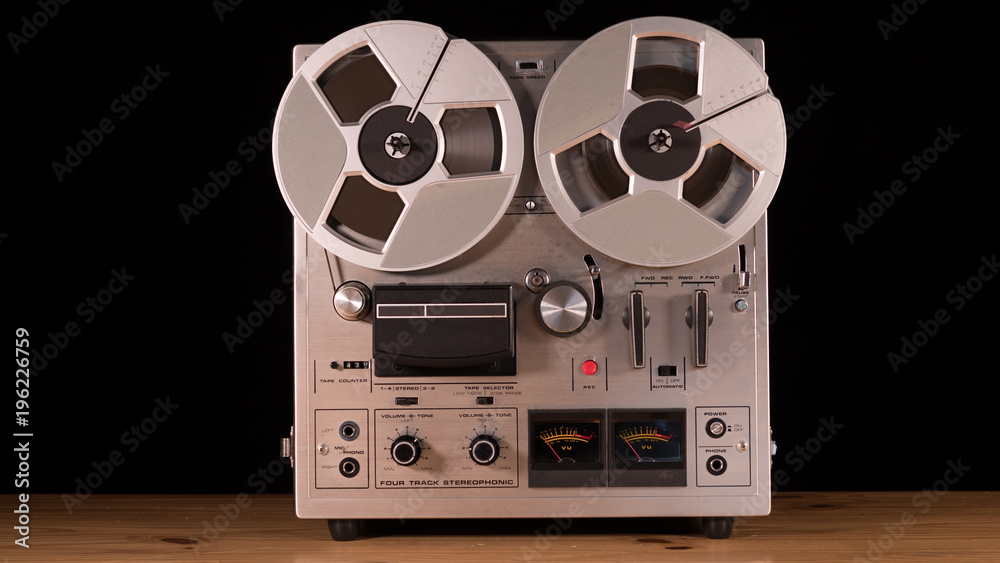 Vintage Reel to Reel tape recorder playing music Stock Photo
