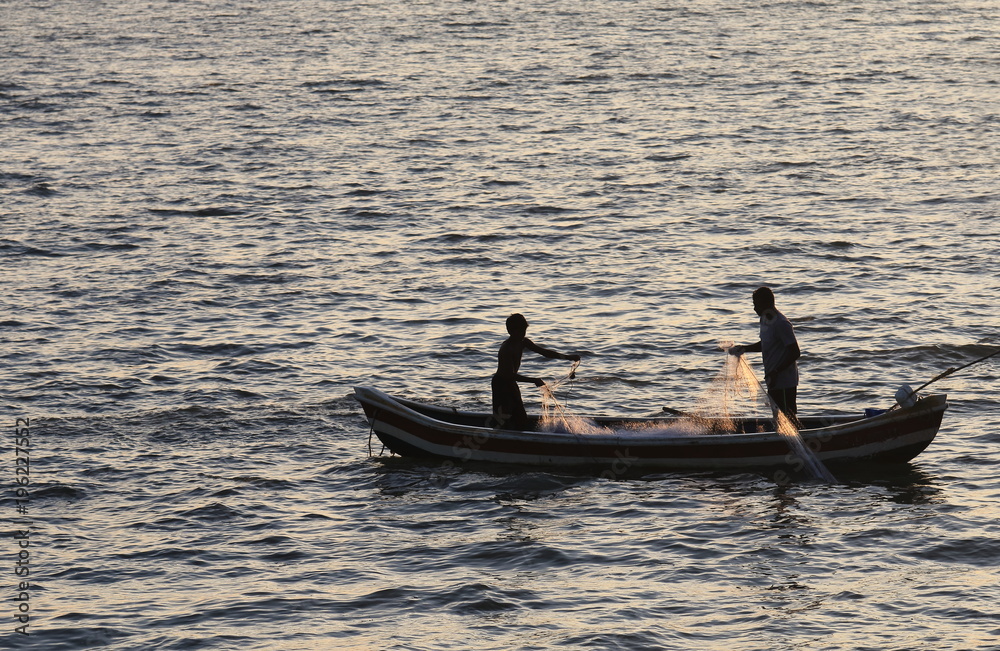 Local people fish in Mumbai India