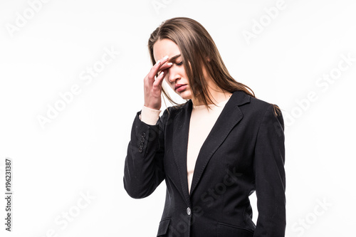 Businesswoman with a headache holding head, isolated on white