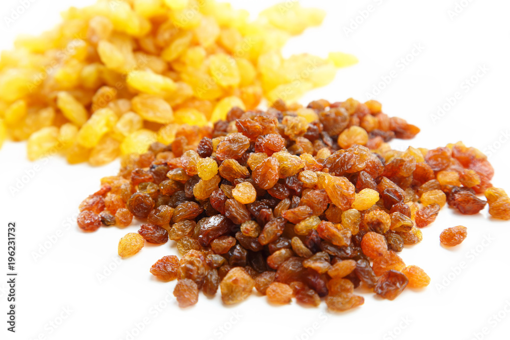 Various raisins on the white background. Dried grapes. Various raisins on the white background. Dried grapes.