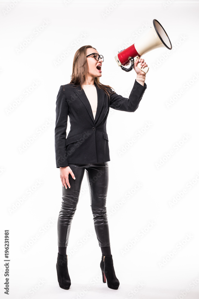 Young businesswoman shouting into loudspeaker isolated on a white background Young businesswoman shouting into loudspeaker isolated on a white background