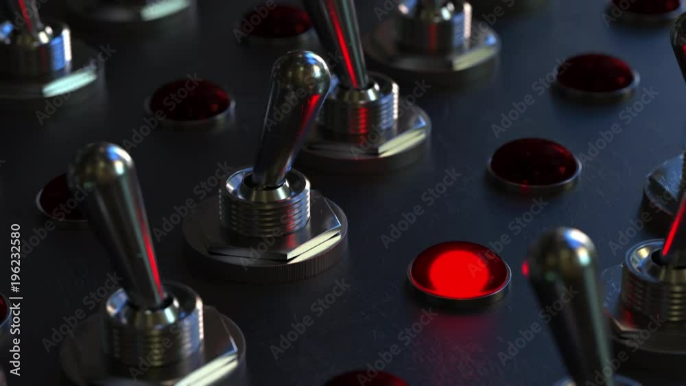Switching toggle switch on a control panel, red light turns on