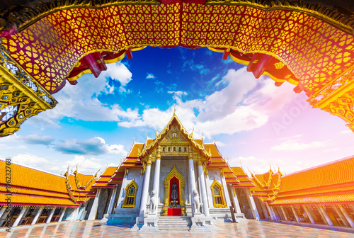 View through the gate to Wat Benchamabophit in Bangkok City, Thailand.. photo