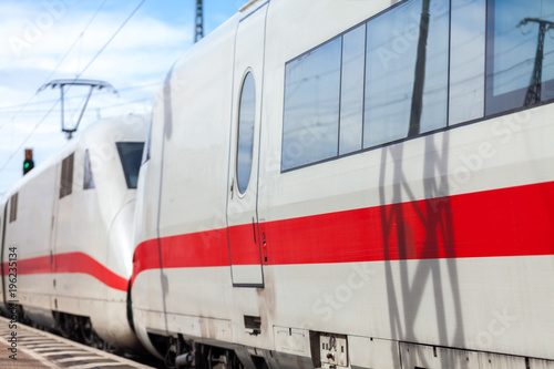 a german train passes a train station