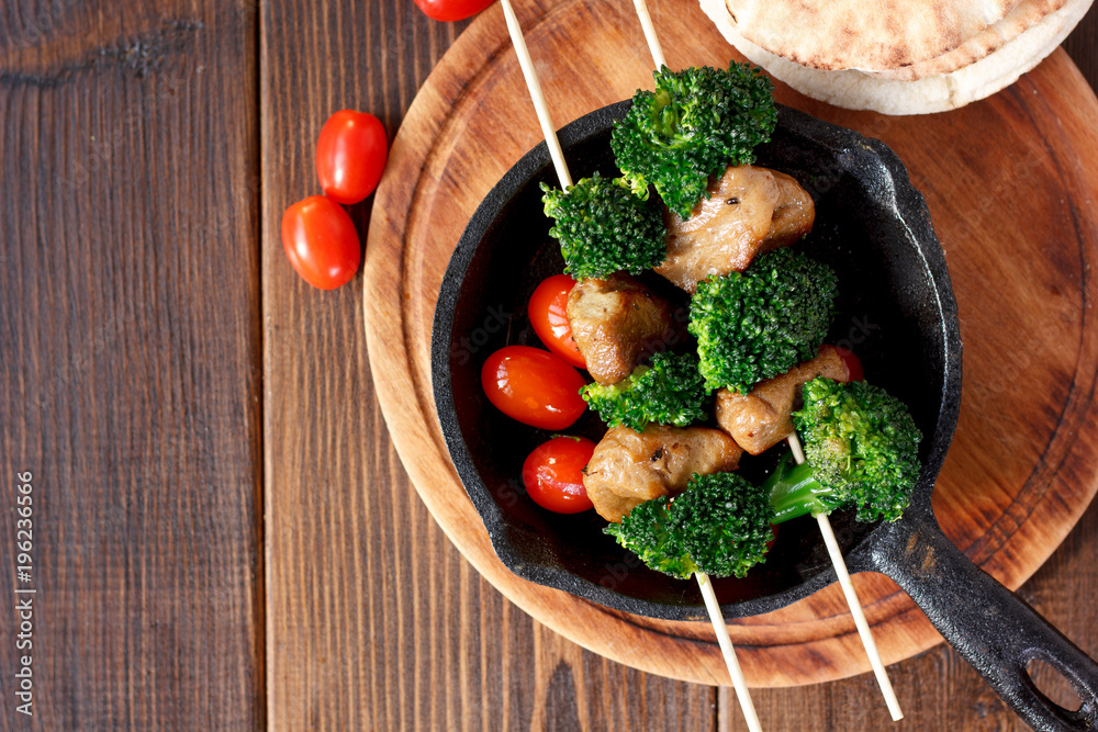 Nice meat kebab with broccoli on skewers Nice meat kebab with broccoli on skewers