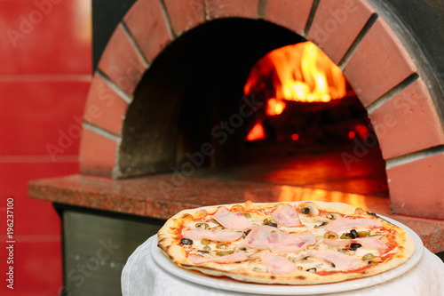 Fresh hot italian pizza wit...