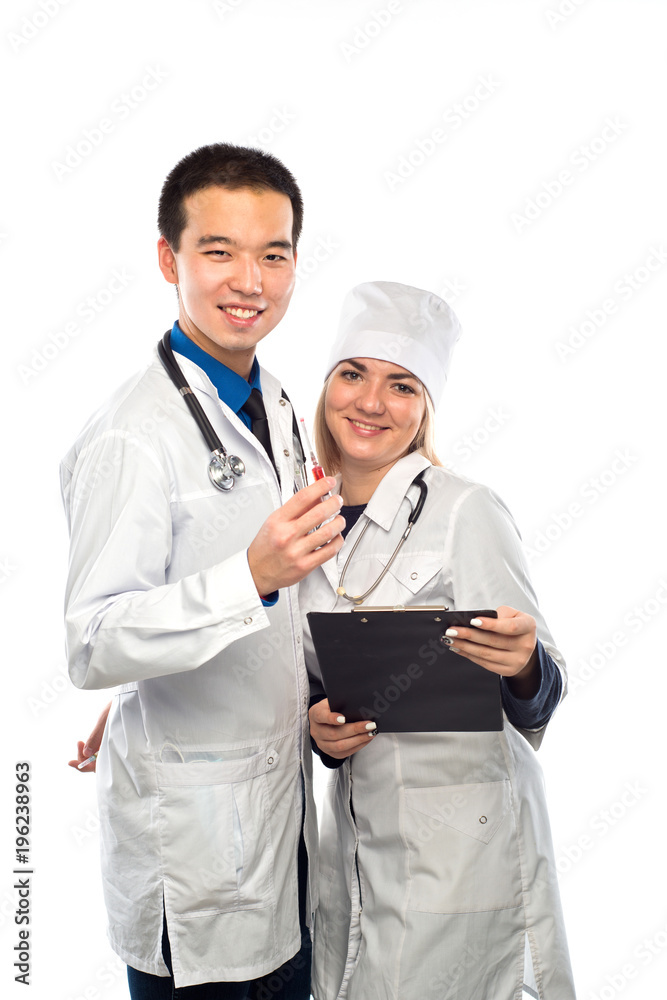 Studio portrait of young doctors in uniform Studio portrait of young doctors in uniform