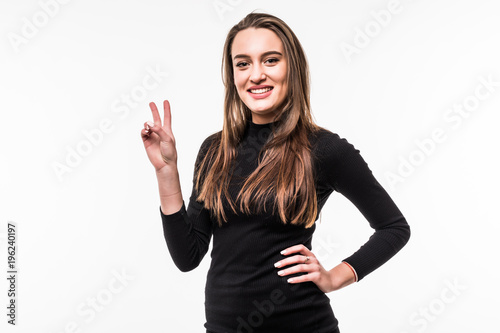 young smiling woman showing victory or peace sign isolated on white