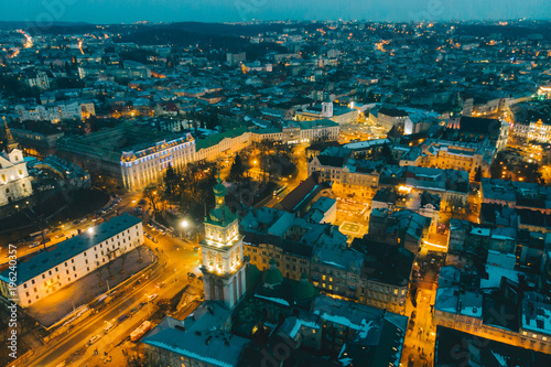 panoramic view of old european city on twilight with red sky. bird's eye view.