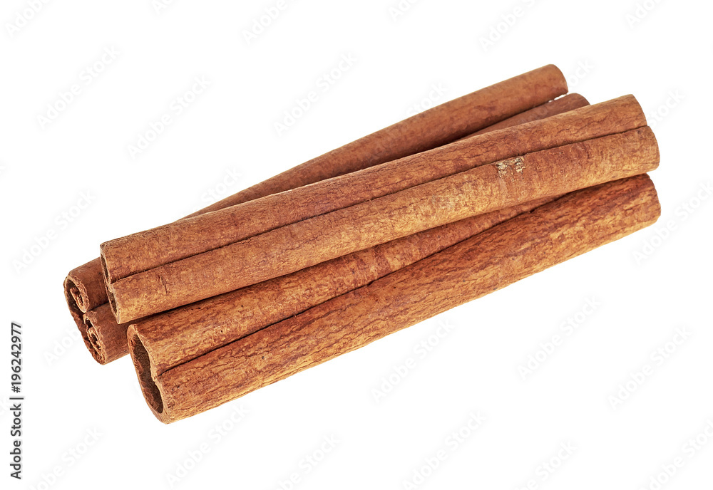 Cinnamon spice isolated on white background. Three cinnamon sticks. Cinnamon spice isolated on white background. Three cinnamon sticks.