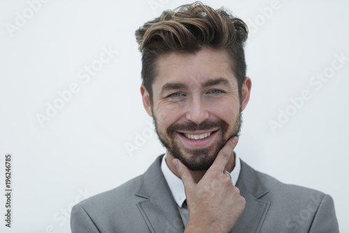 portrait of successful business man holding his hand on chin © ASDF