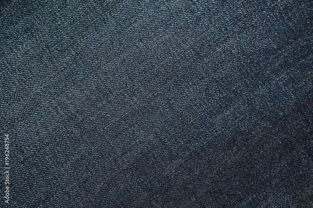 Texture of dark blue jeans, fabric macro background. Texture of dark blue jeans, fabric macro background.