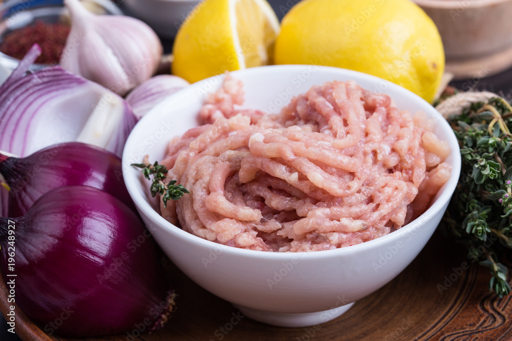 Minced chicken meat. Fresh ingredients for healthy meal preparation Minced chicken meat. Fresh ingredients for healthy meal preparation
