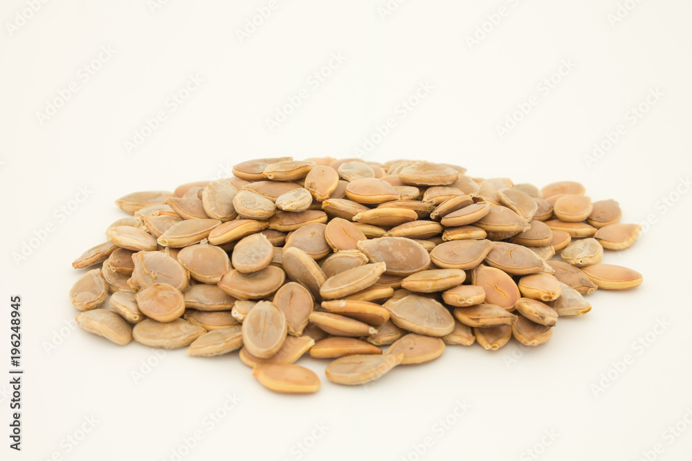 Pumpkin seeds isolated on the white background Pumpkin seeds isolated on the white background