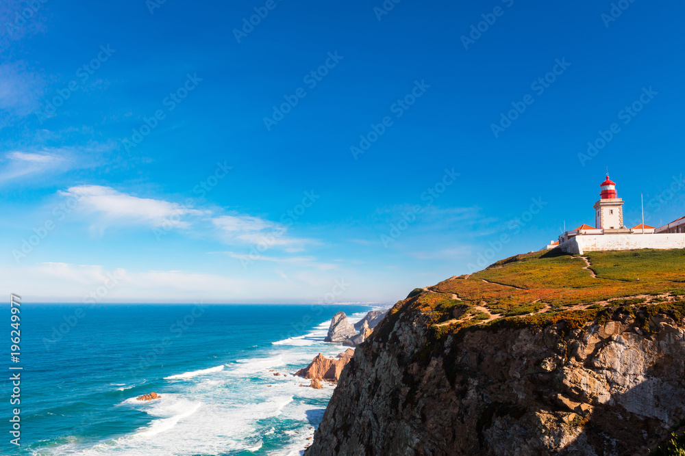 Scenic landscape with lighthouse at the Cabo da Roca, a cape which forms the westernmost extent of mainland Portugal.